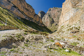 Sunny view of  mountains and Eltyulbyu village in North Caucasus, Kabardino-Balkaria, Russia.