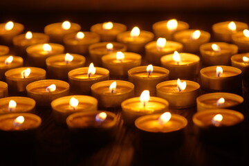 Burning candles. Shallow depth of field. Many christmas candles burning at night. Abstract candles...