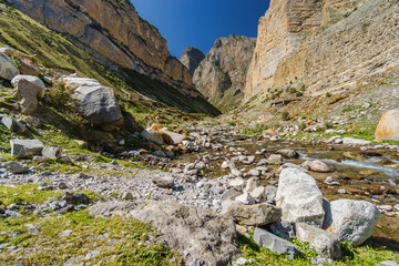 Sunny view of  mountains and Eltyulbyu village in North Caucasus, Kabardino-Balkaria, Russia.