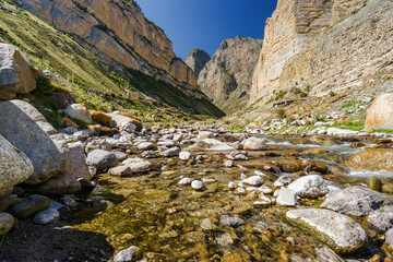 Sunny view of  mountains and Eltyulbyu village in North Caucasus, Kabardino-Balkaria, Russia.