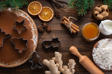 Chocolate dough for gingerbread cookies and organic, healthy ingredients for Christmas baking on a...