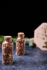 New Year's set for mulled wine in a wood box. Fragrant spices, orange peel, cinnamon sticks, badyan.