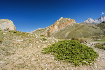 Sunny view of  mountains and Eltyulbyu village in North Caucasus, Kabardino-Balkaria, Russia.