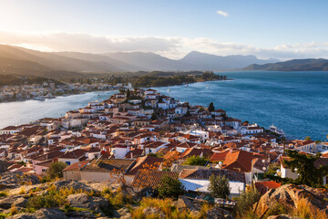 View of the Chora village of Poros island and Galatas village.