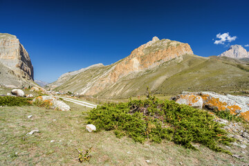 Sunny view of  mountains and Eltyulbyu village in North Caucasus, Kabardino-Balkaria, Russia.
