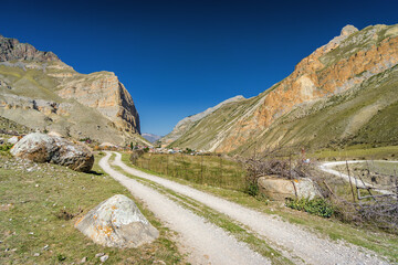 Sunny view of  mountains and Eltyulbyu village in North Caucasus, Kabardino-Balkaria, Russia.