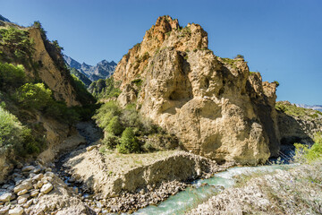 Sunny view of  mountains and Eltyulbyu village in North Caucasus, Kabardino-Balkaria, Russia.