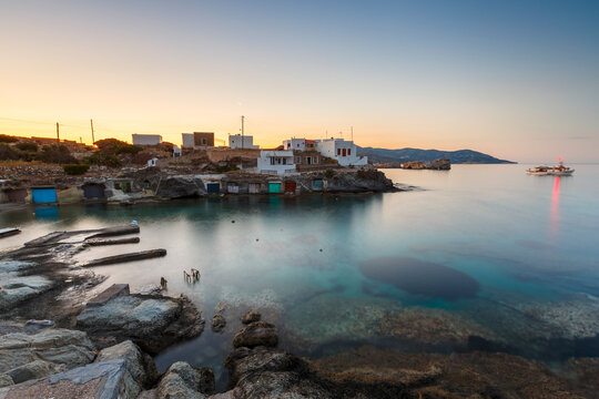 Boat houses in fishing village of Goupa on Kimolos island in Greece.