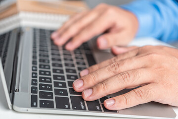 businessman hand using laptop computer