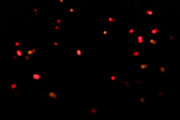 Bokeh of red lights on black background