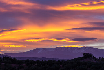 Large lenticular clouds over Sierra Nevada at sunrise