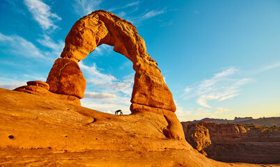 Panoramic view of the iconic Delicate Arch at sunset, Arches National Park, Utah, USA.