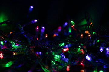 Colorful multicolored Christmas lights background. Holidays.