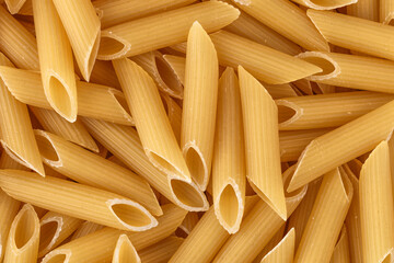 Macaroni, pasta, made by durum wheat.Pasta background. Testure for design.