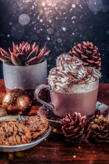 Christmas-themed hot chocolate with holiday decorations on vintage wooden coffee table, coffee, hot beverage Christmas stock photo
