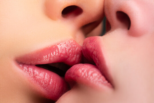 Lgbt couple. Lesbian kissing. Kiss red lips. Sexy mouth.