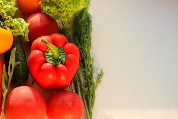 Background from juicy ripe and tasty vegetables with copy space