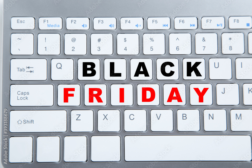 Poster background of new computer keyboard with text black friday