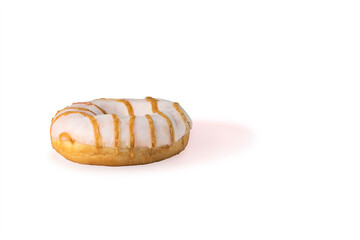 Pink donut decorated with colorful sprinkles isolated on white background. Flat lay