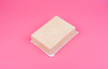 milk cake on a pink background