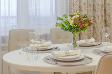 beautiful bouquet of flowers on the dining table