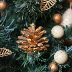 Obraz premium New Year's toys on a fir-tree