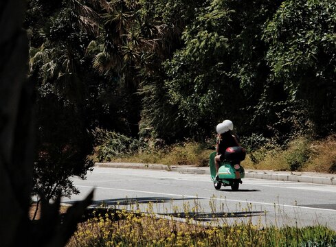 Green Motorbike On The Road.