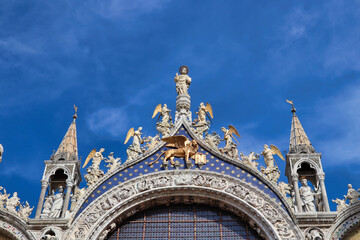 Fototapeta na wymiar Ornaments details of San Marco facade cathedral in Venice