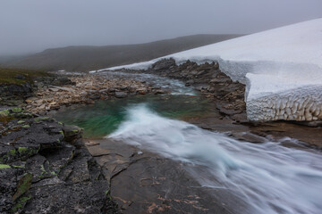 Landscape with mountain river in foggy morning, Norway