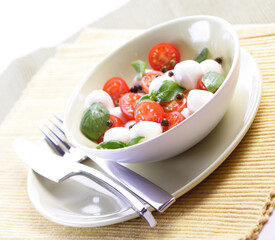 Close of tomato and mozarella in dish