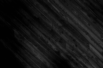 Abstract black background with diagonal wooden board texture. Elegant dark gray grunge nature...