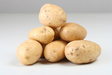 Close up of potatoes on white backround