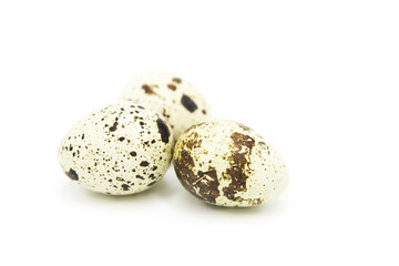 Obraz premium Quail organic eggs isolated on white background. Сopy space on a white background