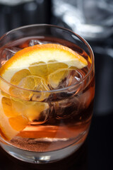 Glass of beverage with ice