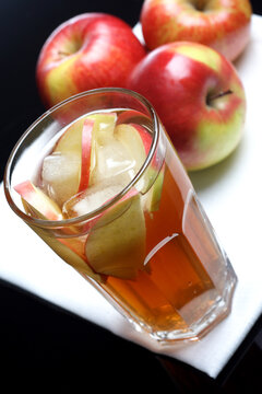 Glass of apple juice with ice