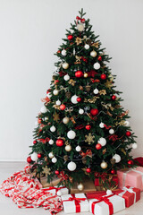New Year's Eve Christmas tree interior with holiday decor gifts