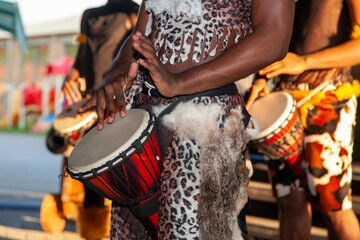 An African drummer plays the djembe.
