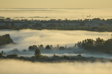 Obraz na płótnie Canvas foggy dawn over the River Volga