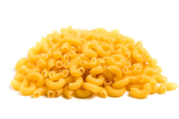 Raw Italian pasta in a heap on the table isolated on white background