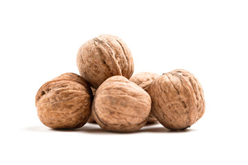 Walnuts in shell isolated on a white background