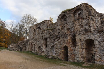 Fototapeta na wymiar Very old ruins of Koknese Castle in the territory of Latvia on the banks of the river October 23 2020