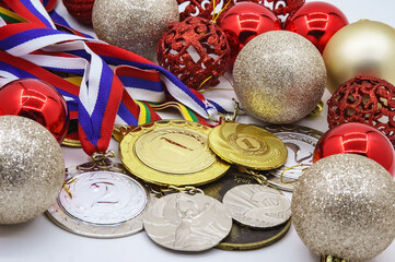Sports awards. Christmas tree toys and medals.