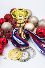 Sports awards. Christmas tree toys and medals.