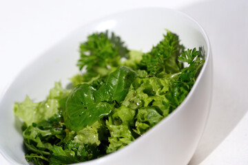 Close-up of salad in white bowl