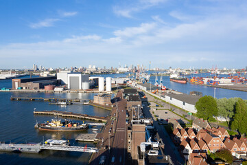 I photographed an urban roadway from above, where lanes of traffic, bicycle paths and tram tracks...