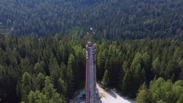 Aerial view of Italian Olympic Ski Jump built in Cortina dAmpezzo for Winter Olympics in 1956. Trampoline Olympic Italia is a ski jumping slide built in 1955 year.