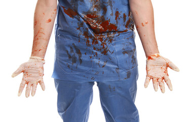 Closeup shot of a surgeon with bloody gloves and scrubs isolated on a white background