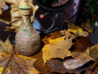 beautiful autumn leaves on a table with a mirror
