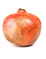 Close-up of pomegranate on white background