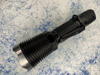 tactical flashlight with steel bezel